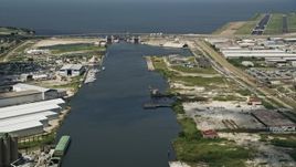 5K aerial stock footage follow Industrial Canal toward the Seabrook Floodgate, New Orleans, Louisiana Aerial Stock Footage | AX59_063