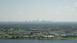 5K aerial stock footage of Downtown New Orleans skyline seen from Lake Pontchartrain, Louisiana Aerial Stock Footage | AX60_001