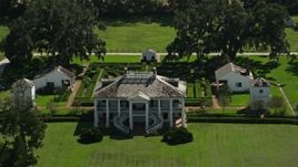 5K aerial stock footage fly over trees to reveal Evergreen Plantation and gardens, Edgard, Louisiana Aerial Stock Footage | AX60_029