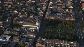 5K aerial stock footage approach St. Louis Cathedral and Jackson Square at sunset, New Orleans, Louisiana Aerial Stock Footage | AX61_014