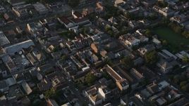 5K aerial stock footage fly over the historic French Quarter in New Orleans at sunset, Louisiana Aerial Stock Footage | AX61_015