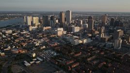 5K aerial stock footage of Downtown New Orleans at sunset, seen from French Quarter and Iberville, Louisiana Aerial Stock Footage | AX61_016