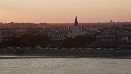 5K aerial stock footage of St. Louis Cathedral at sunset in the French Quarter of New Orleans, Louisiana Aerial Stock Footage | AX61_055