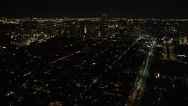 5K aerial stock footage of a view of Downtown New Orleans at night, Louisiana Aerial Stock Footage | AX62_021