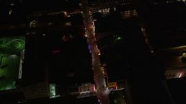 5K aerial stock footage bird's eye of historic Bourbon Street through French Quarter at night, New Orleans, Louisiana Aerial Stock Footage | AX62_026
