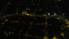5K aerial stock footage urban homes around St. Claude Avenue and Elysian Fields Avenue at night, Gentilly New Orleans, Louisiana Aerial Stock Footage | AX62_046