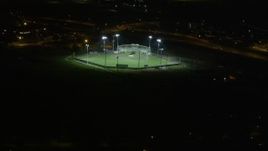 5K aerial stock footage of Wesley Barrow Stadium at night, New Orleans. Louisiana Aerial Stock Footage | AX62_051