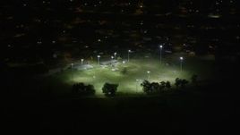 5K aerial stock footage of a baseball field in Gentilly at night, New Orleans, Louisiana Aerial Stock Footage | AX63_003
