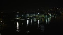 5K aerial stock footage flyby Algiers Ferry Terminal and piers on the Mississippi River at night in Algiers, New Orleans, Louisiana Aerial Stock Footage | AX63_010