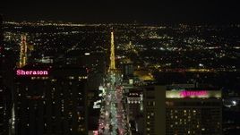 5K aerial stock footage pan across Downtown New Orleans at night, revealing Canal Street, Louisiana Aerial Stock Footage | AX63_018