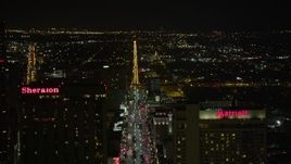 5K aerial stock footage pan across Downtown New Orleans at night, revealing Canal Street, Louisiana Aerial Stock Footage | AX63_018E