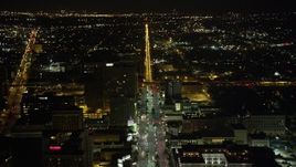 5K aerial stock footage follow Canal Street through Downtown New Orleans at night, Louisiana Aerial Stock Footage | AX63_019
