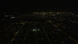 5K aerial stock footage of neighborhoods in New Orleans East at night, Louisiana Aerial Stock Footage | AX63_046