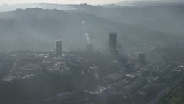 5K aerial stock footage of 10 Universal City Plaza skyscraper and office buildings in Universal City, California Aerial Stock Footage | AX64_0023