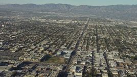 5K aerial stock footage pan across suburban neighborhoods to reveal the Burbank Airport, California Aerial Stock Footage | AX64_0026