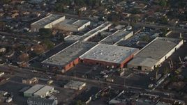 5K aerial stock footage approach a group of warehouse buildings in Sun Valley, California Aerial Stock Footage | AX64_0053E