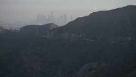 5K aerial stock footage of the hazy Downtown Los Angeles skyline in California Aerial Stock Footage | AX64_0069