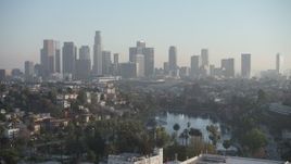 5K aerial stock footage of Echo Lake and the Downtown Los Angeles skyline, California Aerial Stock Footage | AX64_0079