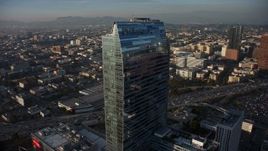 5K aerial stock footage fly around Staples Center and Ritz-Carlton to reveal skyscrapers in Downtown Los Angeles, California Aerial Stock Footage | AX64_0089E