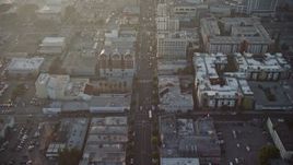 5K aerial stock footage of cars on Hollywood Boulevard through Hollywood, California, Sunset Aerial Stock Footage | AX64_0117E