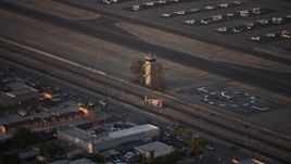 5K aerial stock footage of airport control tower at Whiteman Airport, Pacoima California, sunset Aerial Stock Footage | AX64_0138E