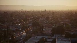 5K aerial stock footage of urban neighborhoods in Pacoima, California, sunset Aerial Stock Footage | AX64_0141