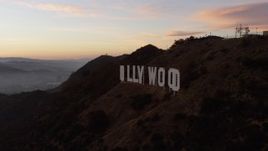 5K aerial stock footage flyby the Hollywood Sign at twilight, Los Angeles, California Aerial Stock Footage | AX64_0167