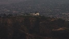 5K aerial stock footage approach the Griffith Observatory at twilight, Los Angeles, California Aerial Stock Footage | AX64_0169