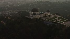 5K aerial stock footage approach and flyby the Griffith Observatory, Los Angeles, California, twilight Aerial Stock Footage | AX64_0170E