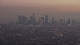 5K aerial stock footage of the Downtown Los Angeles skyline in haze, California, twilight Aerial Stock Footage | AX64_0176