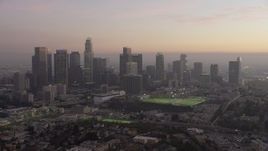 5K aerial stock footage flyby the Downtown Los Angeles skyline at twilight, California Aerial Stock Footage | AX64_0186
