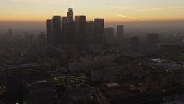 5K aerial stock footage of Downtown Los Angeles skyscrapers behind concert halls at twilight, California Aerial Stock Footage | AX64_0189E