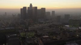 5K aerial stock footage flyby the Downtown Los Angeles skyline to reveal City Hall, California, twilight Aerial Stock Footage | AX64_0190