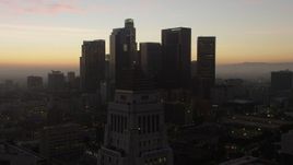 5K aerial stock footage flyby the top of City Hall for a view of Downtown Los Angeles skyline, California, twilight Aerial Stock Footage | AX64_0192