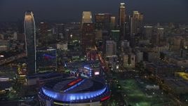 5K aerial stock footage of 110 Freeway, Downtown Los Angeles skyscrapers, The Ritz-Carlton, Staples Center, California, twilight Aerial Stock Footage | AX64_0224E