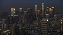 5K aerial stock footage of Downtown Los Angeles skyscrapers reflecting the twilight, California Aerial Stock Footage | AX64_0227E