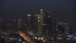 5K aerial stock footage of Downtown Los Angeles towers and 110 freeway, California, twilight Aerial Stock Footage | AX64_0235