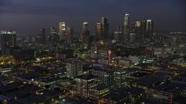 5K aerial stock footage approach Downtown Los Angeles office buildings and skyscrapers, California, twilight Aerial Stock Footage | AX64_0243