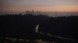 5K aerial stock footage of Downtown Los Angeles skyline seen from Elysian Park, California, twilight Aerial Stock Footage | AX64_0257