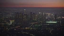 5K aerial stock footage of an approach to Downtown Los Angeles skyscrapers in California at twilight Aerial Stock Footage | AX64_0261E