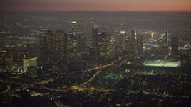 5K aerial stock footage approach Downtown Los Angeles skyscrapers at twilight in California Aerial Stock Footage | AX64_0262