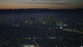 5K aerial stock footage of Century City skyscrapers at night in Los Angeles, California Aerial Stock Footage | AX64_0281E
