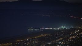 5K aerial stock footage of the Santa Monica Pier at night in Los Angeles, California Aerial Stock Footage | AX64_0294E