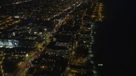 5K aerial stock footage of Ocean Avenue and Loews Santa Monica Beach Hotel, Santa Monica, California, night Aerial Stock Footage | AX64_0308E