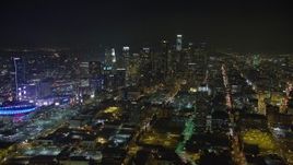 5K aerial stock footage of Downtown Los Angeles skyscrapers, reveal Staples Center, California, night Aerial Stock Footage | AX64_0360E