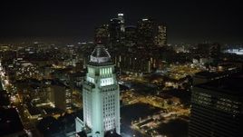 5K aerial stock footage flyby Los Angeles City Hall to focus on the Downtown Los Angeles skyline, California, night Aerial Stock Footage | AX64_0370
