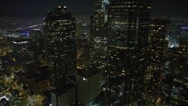 5K aerial stock footage flyby Los Angeles City Hall and then over the Downtown Los Angeles skyline, California, night Aerial Stock Footage | AX64_0370E