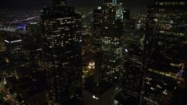 5K aerial stock footage approach Downtown Los Angeles skyscrapers and reveal the LA Public Library, California, night Aerial Stock Footage | AX64_0372