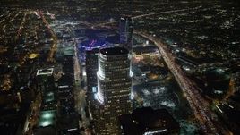 5K aerial stock footage of 777 Tower, Staples Center, and The Ritz-Carlton Hotel, Downtown Los Angeles, California, night Aerial Stock Footage | AX64_0374