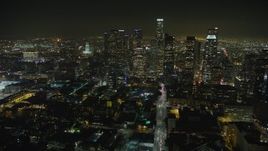 5K aerial stock footage follow 6th Street to approach Downtown Los Angeles and skyscrapers, California, night Aerial Stock Footage | AX64_0379E